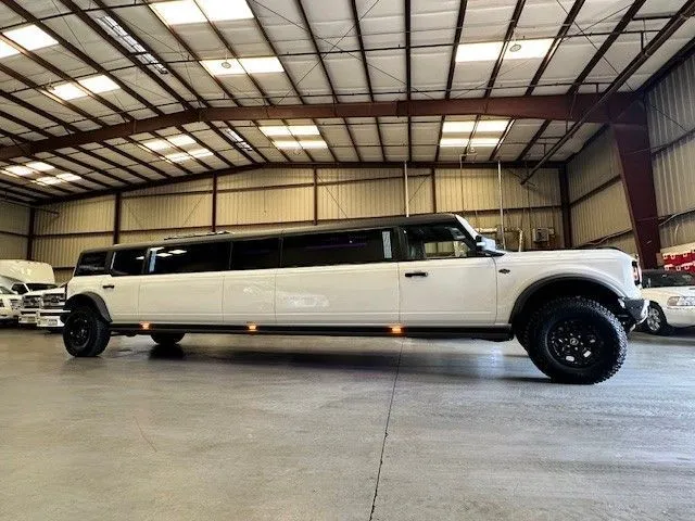 13 Passenger Bronco Limousine with Jet Door for limo rental