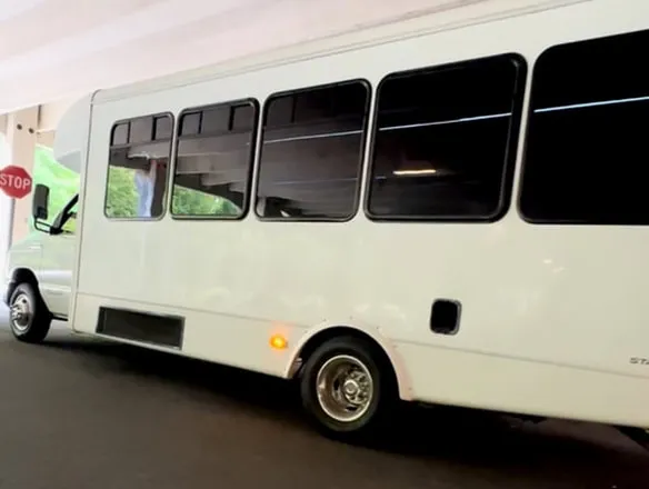 Ford E-450 Series Party Bus White Ford E-450 Series Party Bus — tinted windows