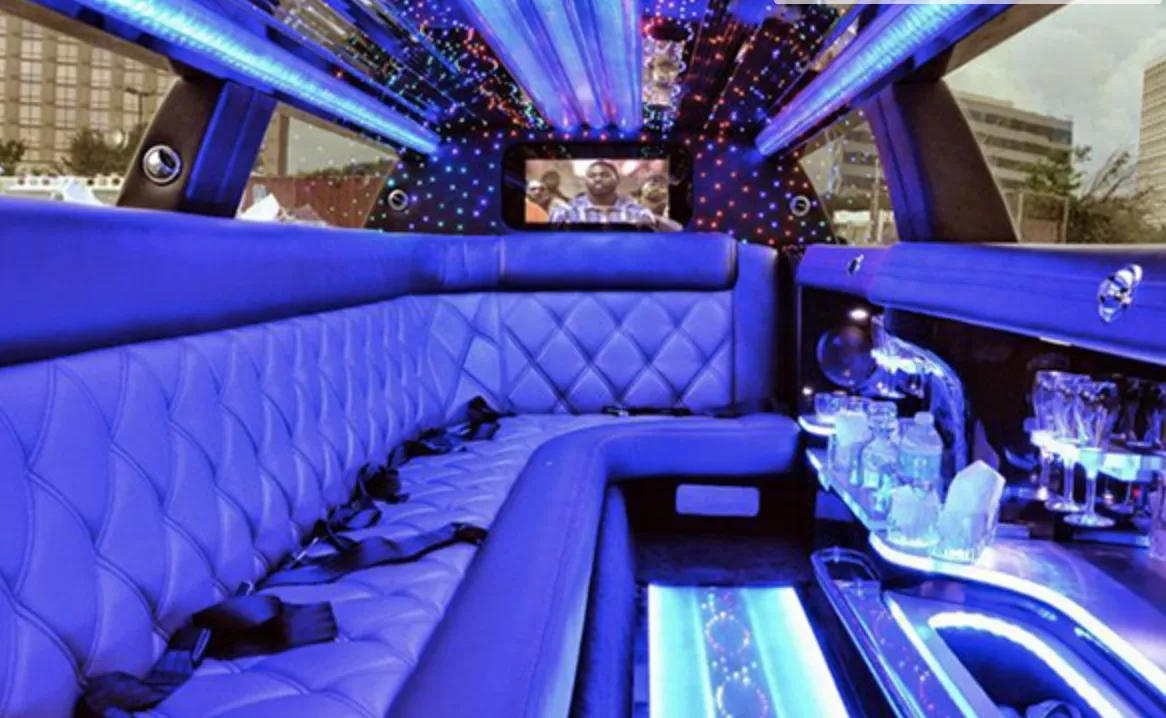 C300 Limousine C300 Limousine interior with sofa-style seating, LED accent lighting and LED ceiling lighting for limo rental