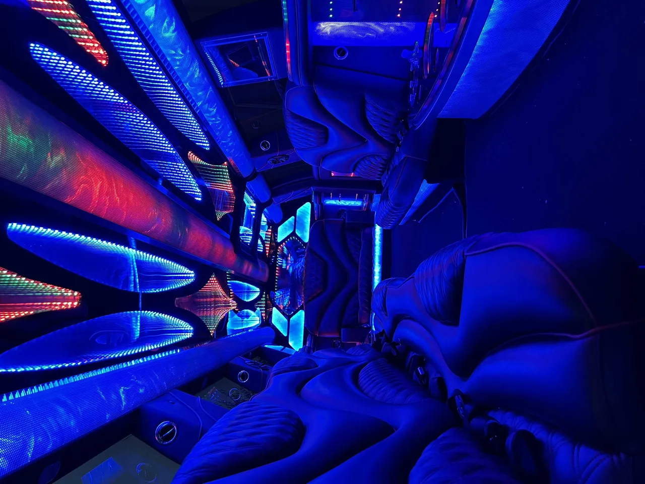 Cadillac Escalade Limo interior with LED accent lighting and LED ceiling lighting for limo rental in Humboldt County, CA