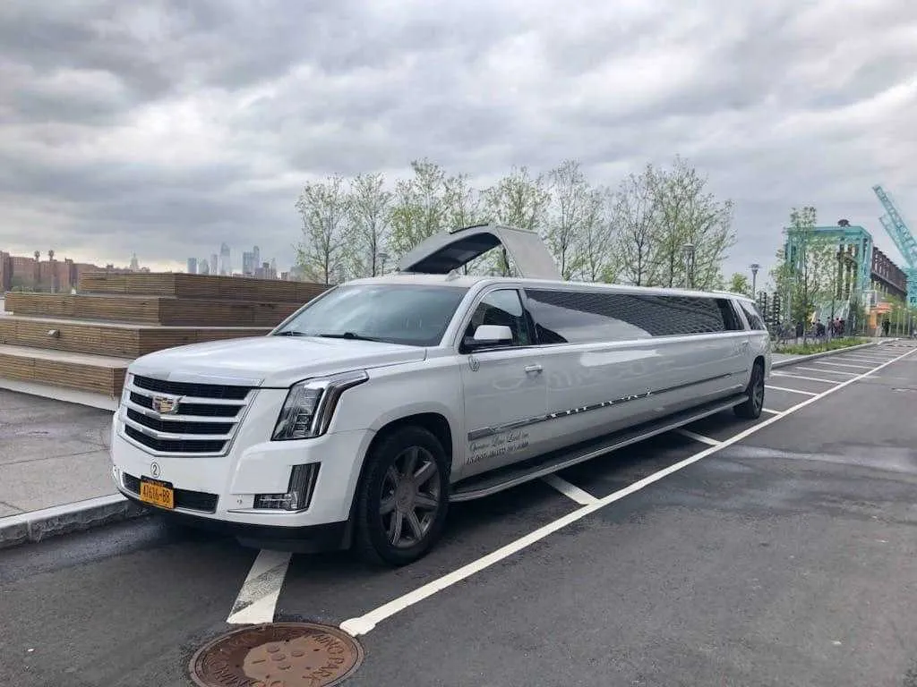 White Cadillac Escalade Limousine for limo rental in Hamilton County, NY White Cadillac Escalade Limousine for limo rental in Hamilton County, NY