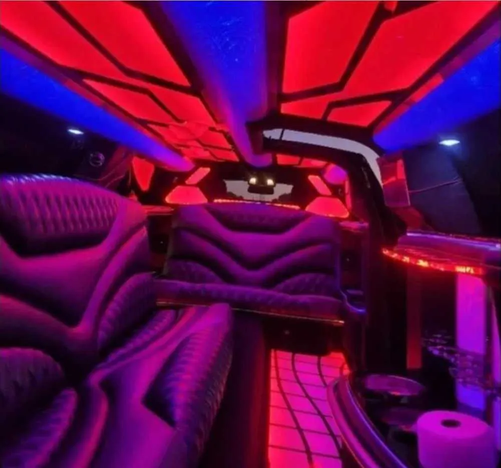 Charger Limousine interior with LED accent lighting, LED ceiling lighting and lit dance floor for limo rental