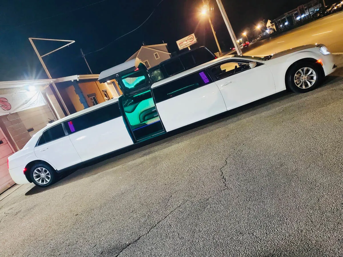 White Chrysler 300 Jet Doors exterior with bridal (jet) door, photo 3 for limo rental