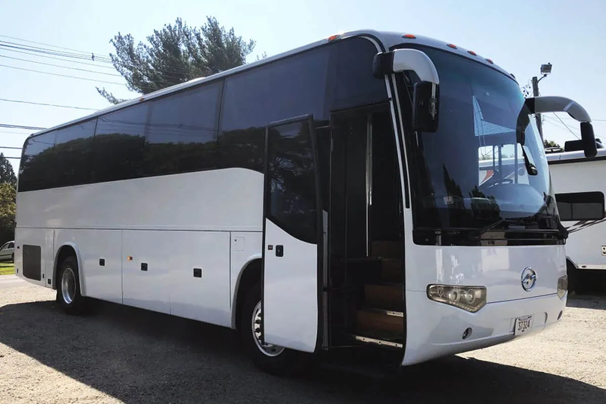 Entertainment Coach exterior with tinted windows for party bus rental