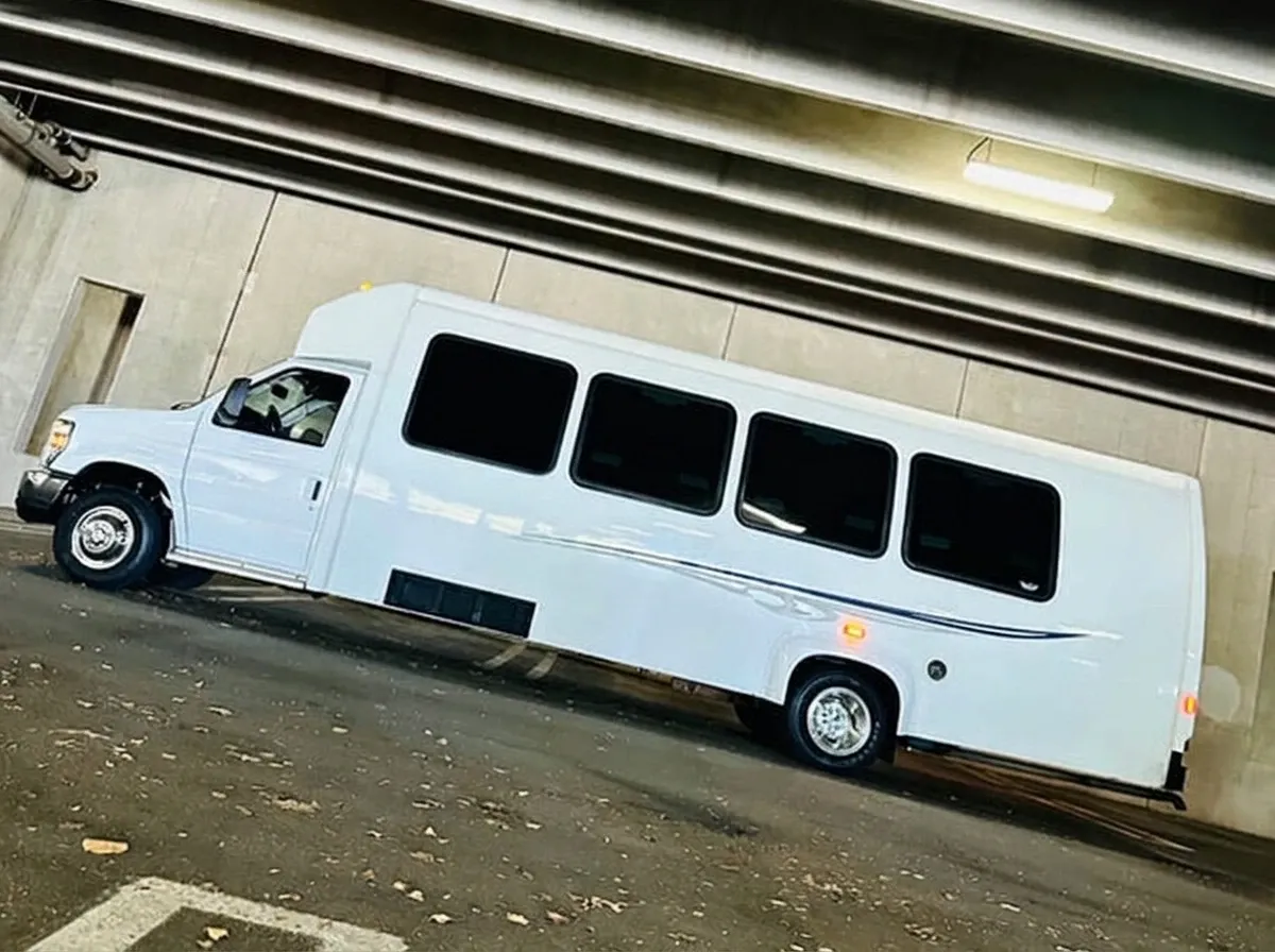Ford E-450 Series Party Bus White Ford E-450 Series Party Bus offered for party bus rental