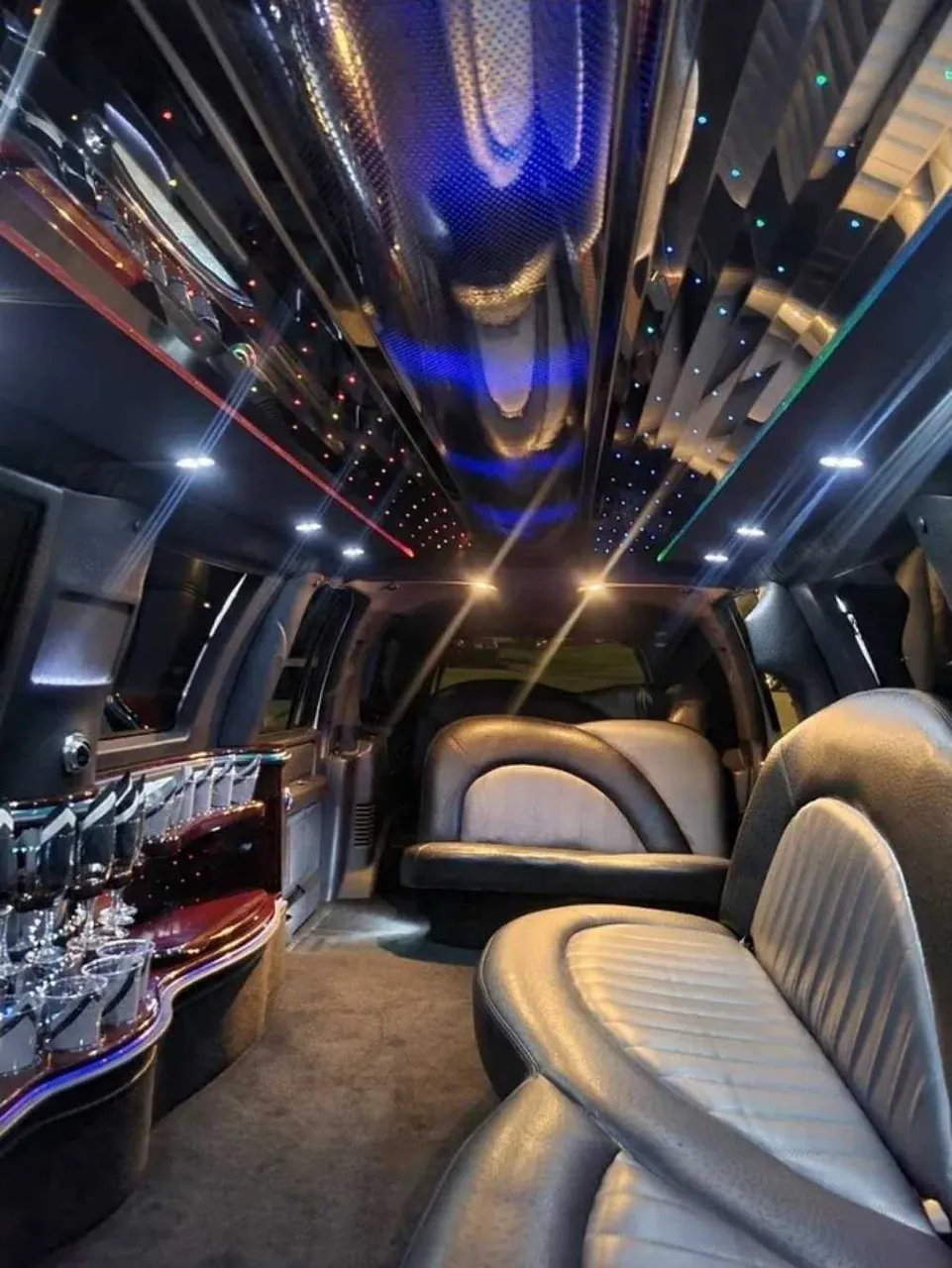 Ford Expedition Limo interior with LED accent lighting, starlight or fiber-optic ceiling and mirrored ceiling, photo 3 for limo rental