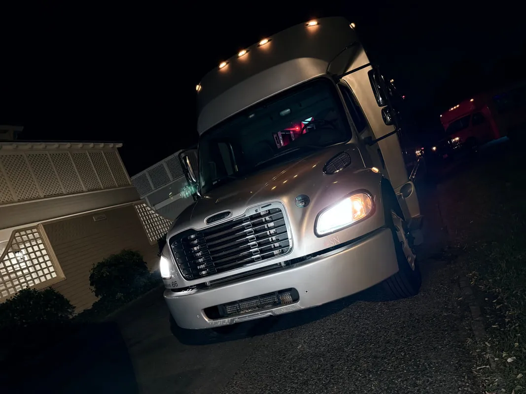 Silver Freightliner Party Bus exterior, photo 3 for party bus rental