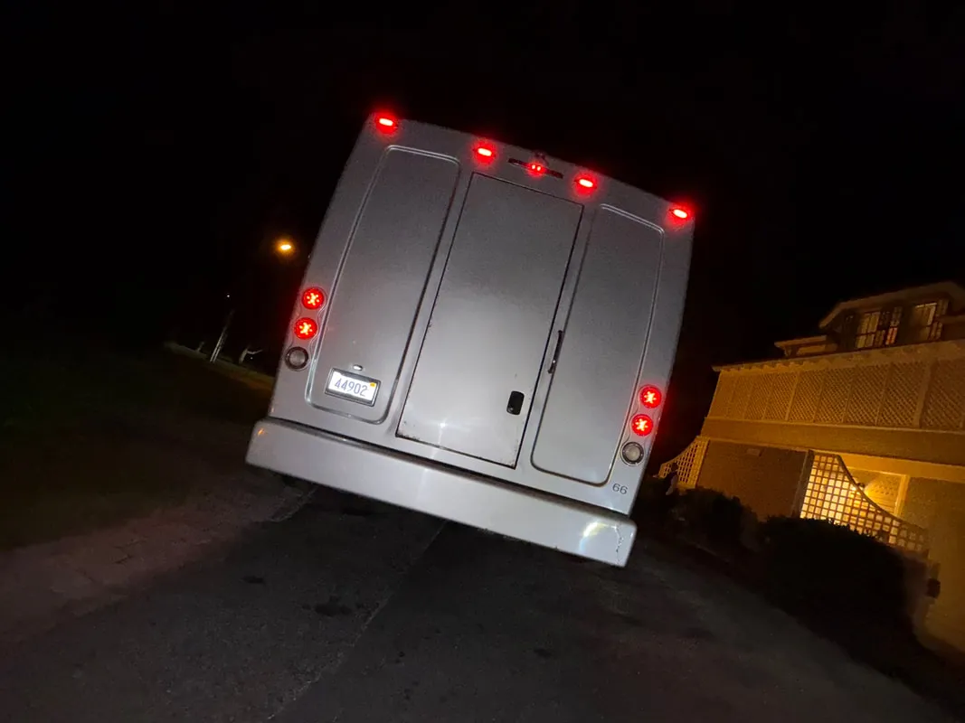 Silver Freightliner Party Bus exterior, photo 7 for party bus rental