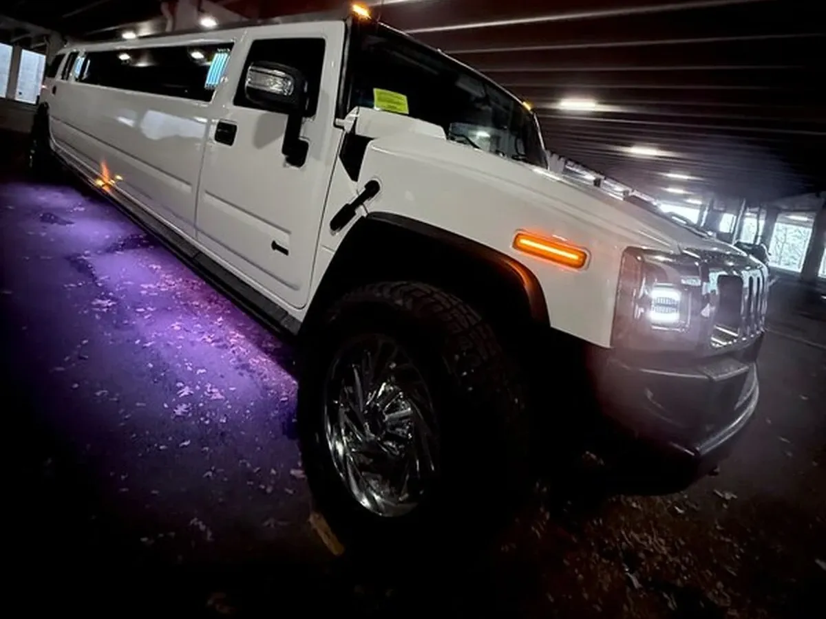 White H2 Hummer offered for limo rental