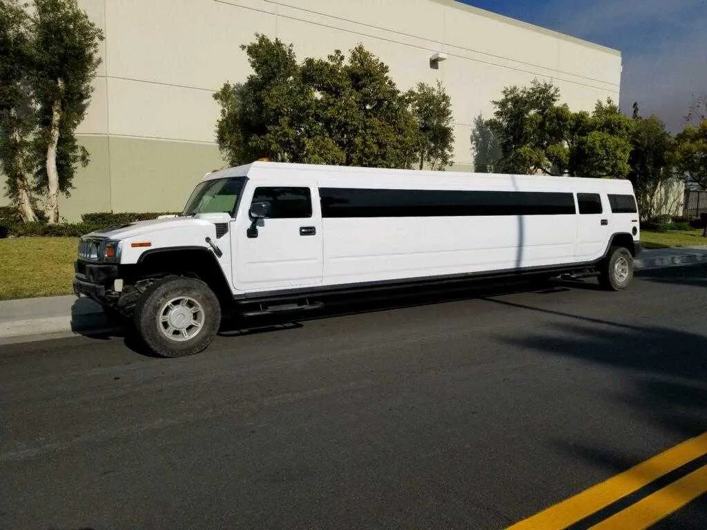 White Hummer Limo with tinted windows for limo rental in Grabill, IN