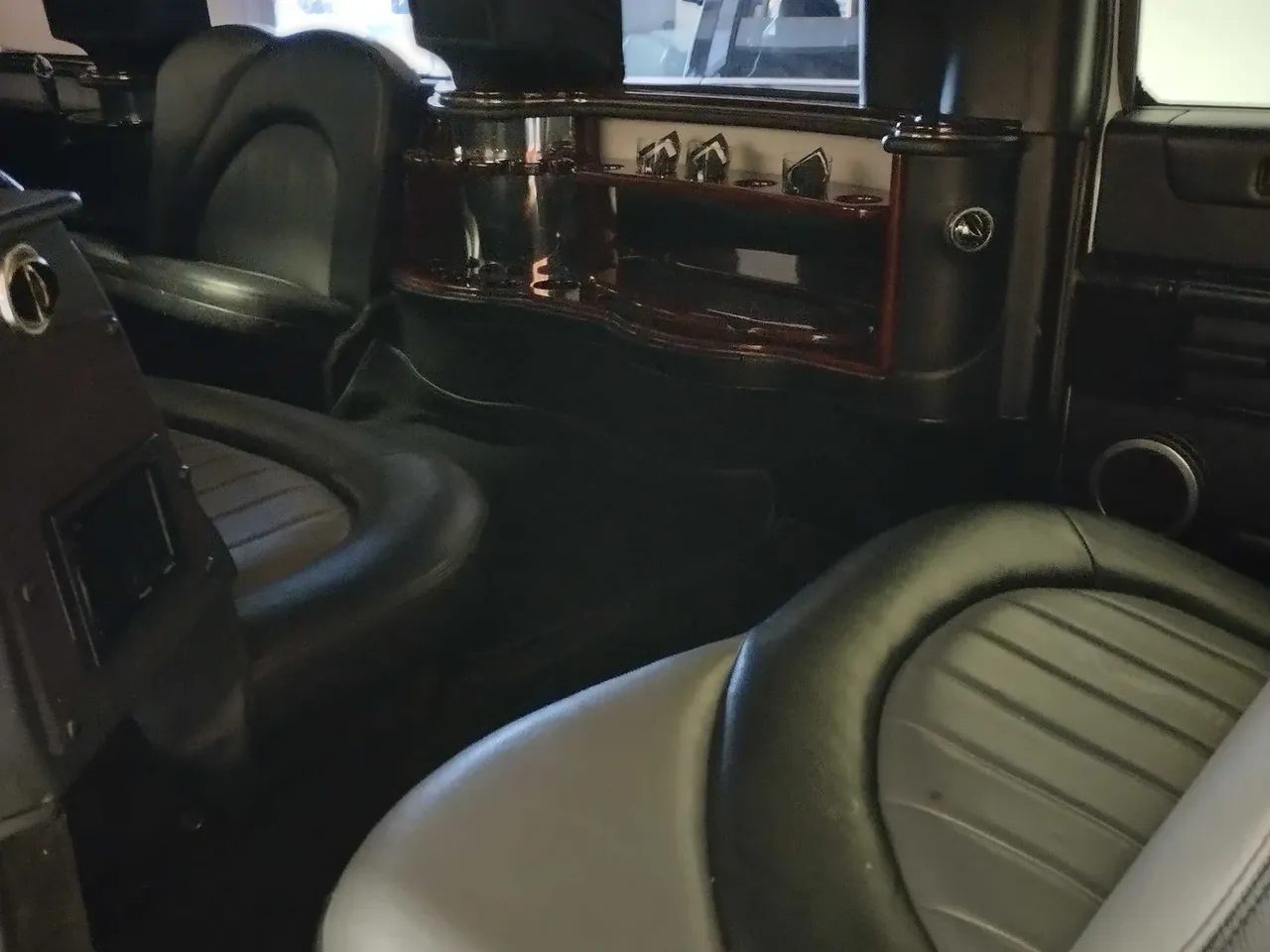 Hummer Limousine White Hummer Limousine offered for limo rental