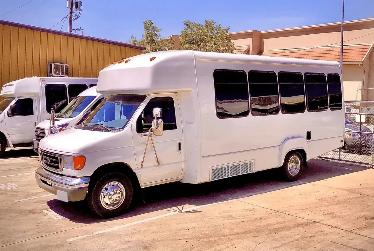 Limousine Party Bus White Limousine Party Bus offered for party bus rental