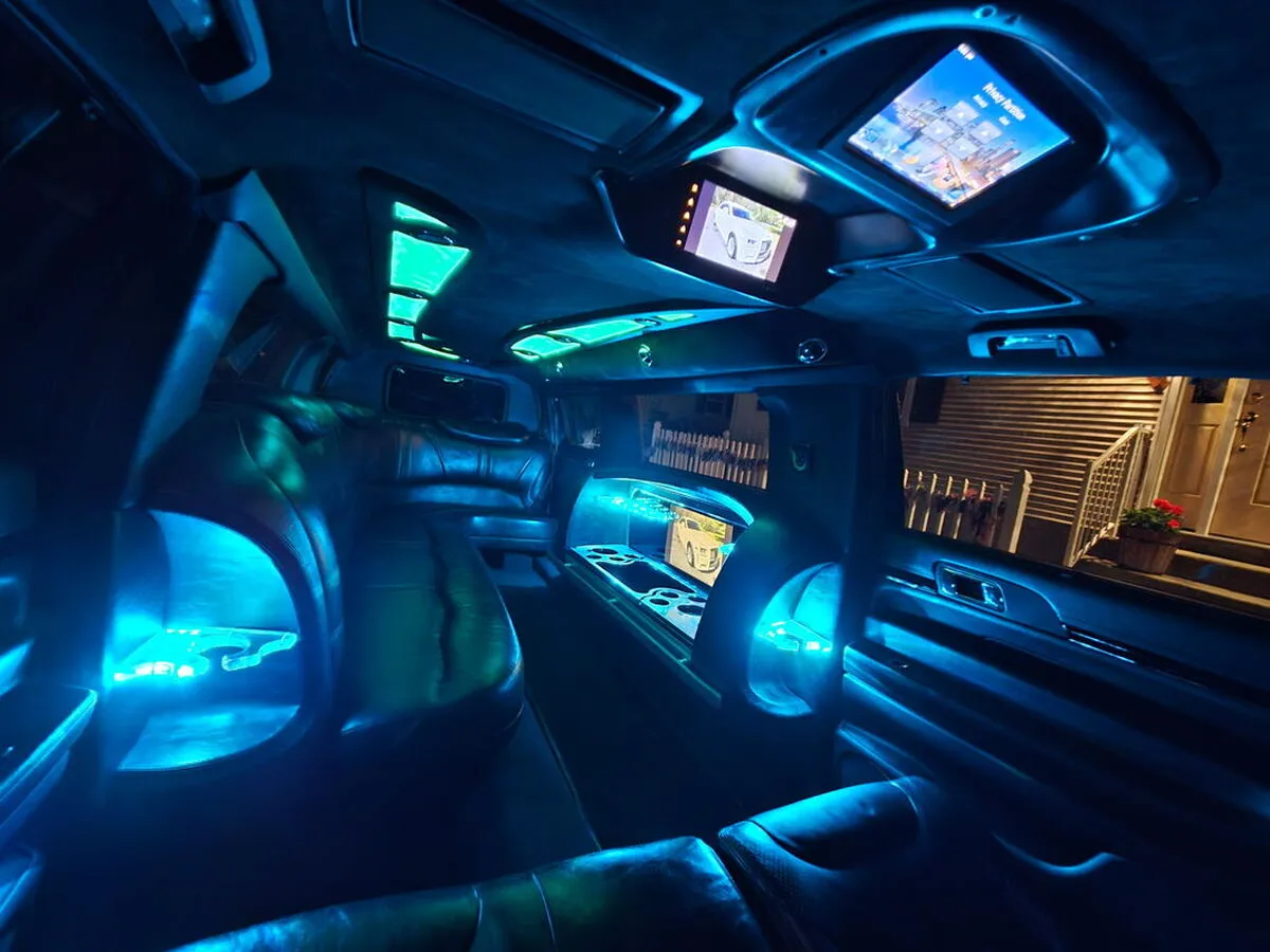 Lincoln MKT Limousine interior with LED accent lighting and TV screens for limo rental in Sierra County, NM Lincoln MKT Limousine interior with LED accent lighting and TV screens for limo rental in Sierra County, NM