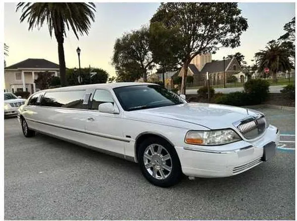 Lincoln Town Car Limousine White Lincoln Town Car Limousine offered for limo rental