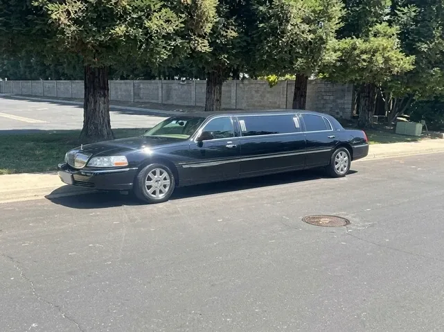Black Lincoln Town Car Limousine offered for limo rental