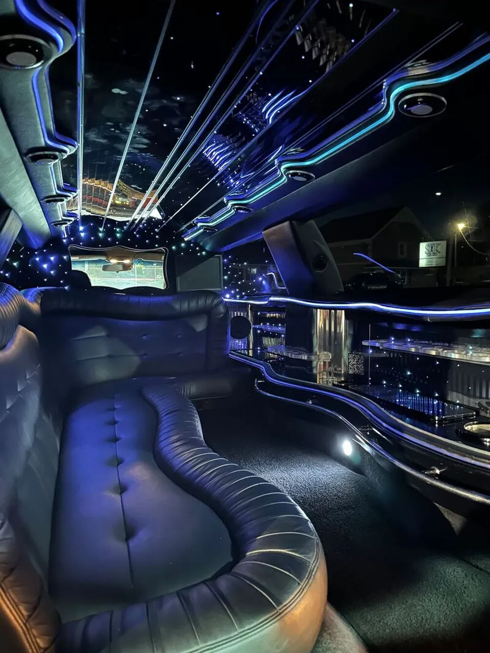 Lincoln Town CAR Limousine interior with sofa-style seating, LED accent lighting and starlight or fiber-optic ceiling for limo rental in Bennington, VT