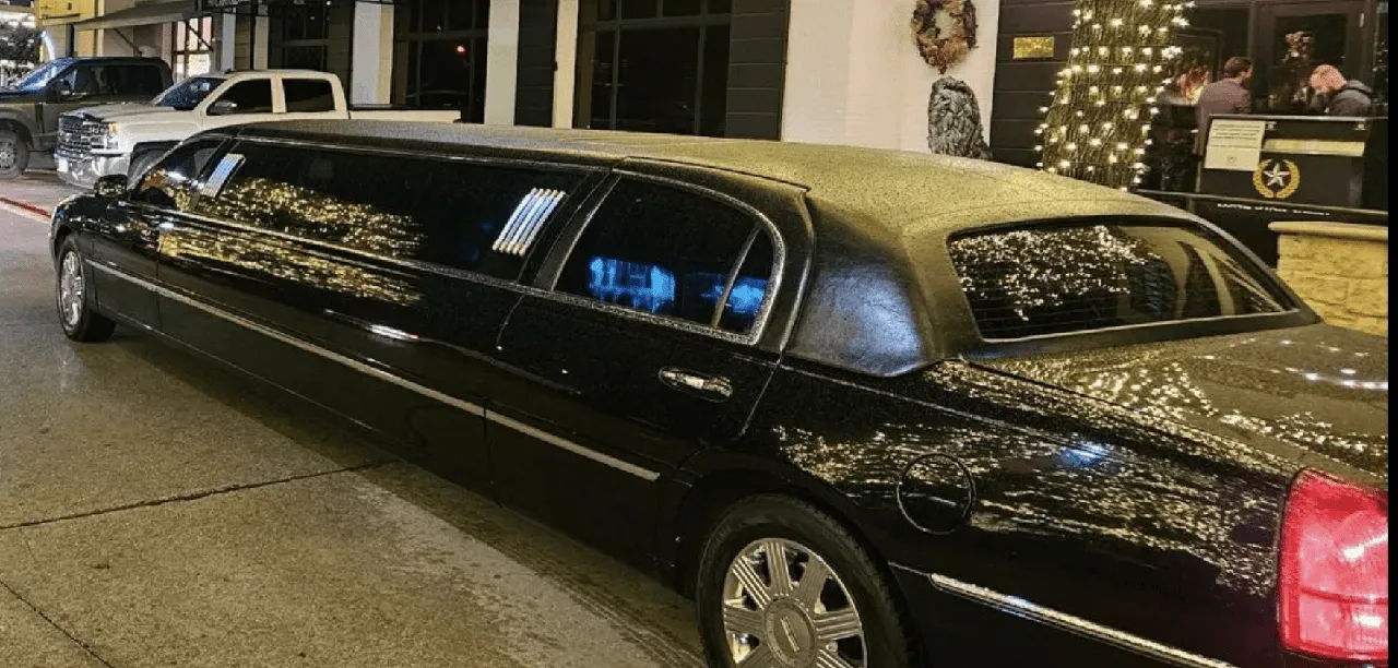 Black Lincoln Town Car with tinted windows for limo rental