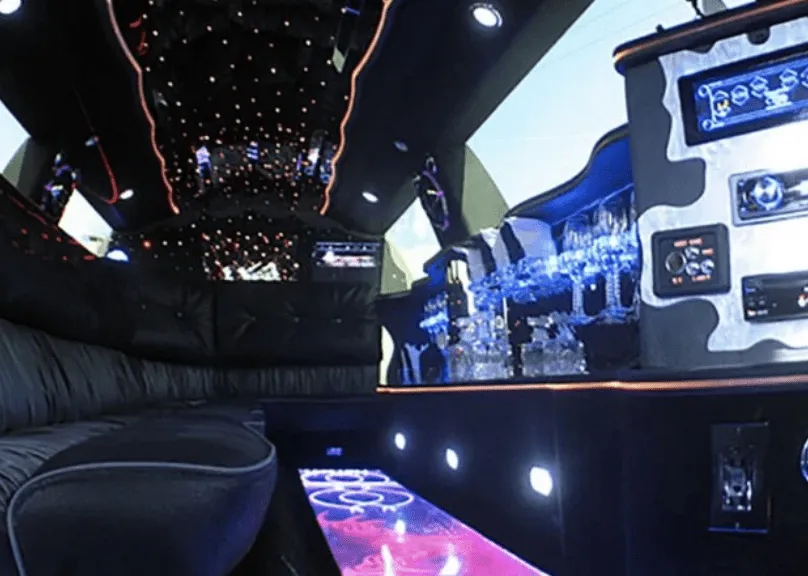 Lincoln Towncar Limo Tuxedo interior with LED accent lighting, starlight or fiber-optic ceiling and lit dance floor for limo rental in Squaw Valley, CA