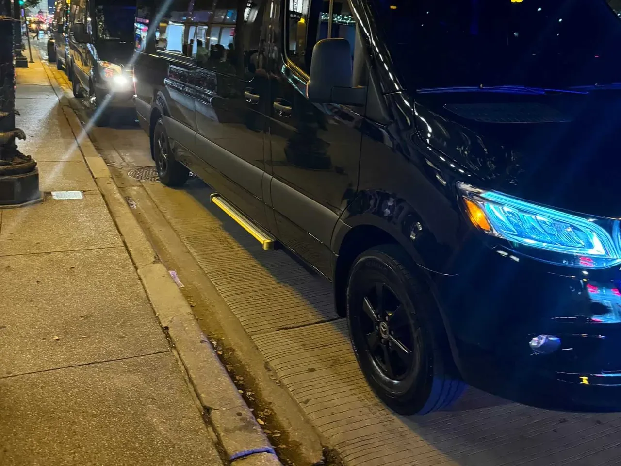 Black Mercedes-Benz Executive Sprinter offered for party bus rental
