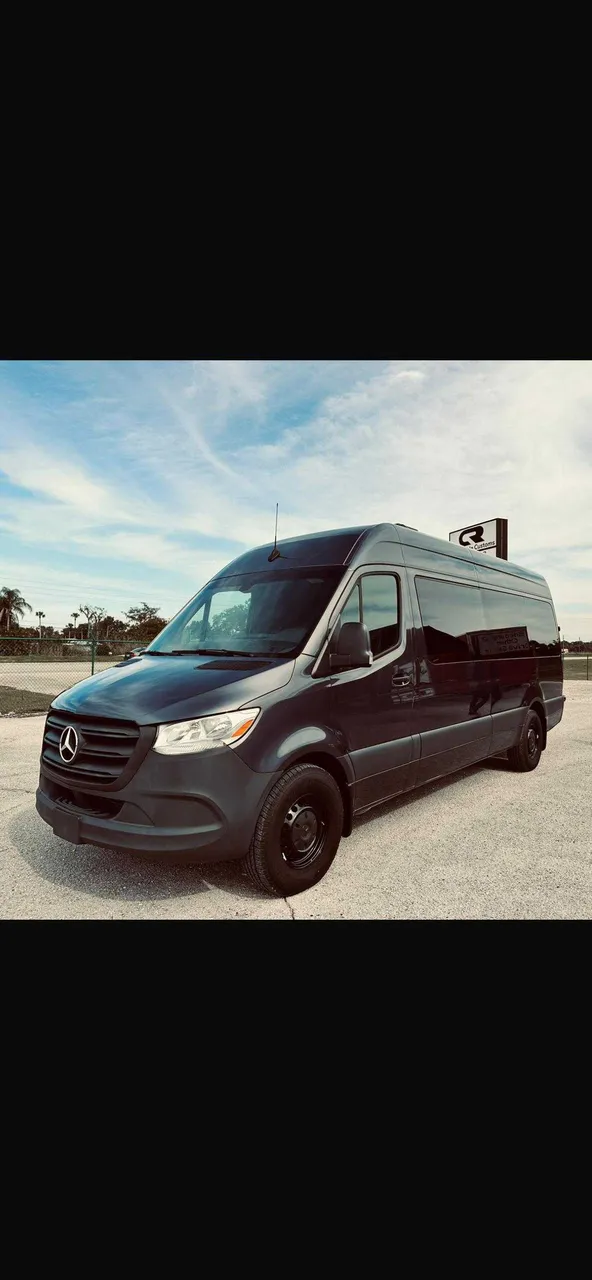 Black Mercedes Limo Coach exterior for party bus rental Black Mercedes Limo Coach exterior for party bus rental