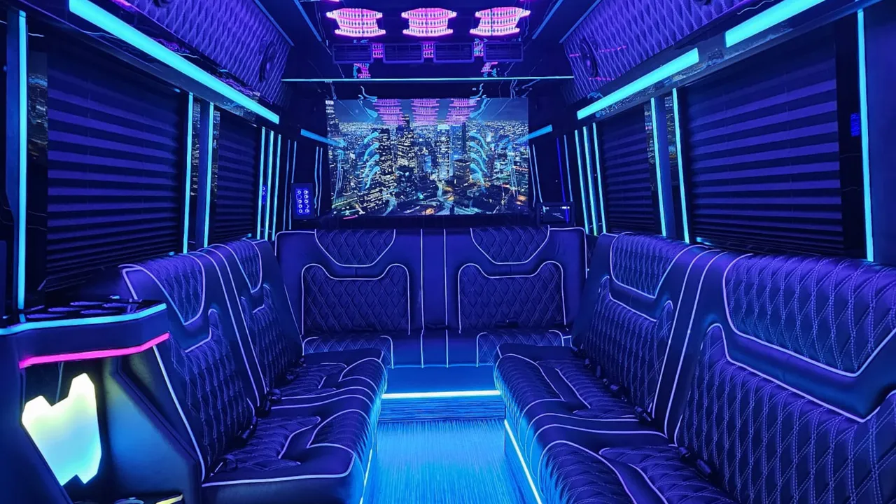 Mercedes-Benz Limousine Sprinter interior with perimeter lounge seating, sofa-style seating and window shades for party bus rental