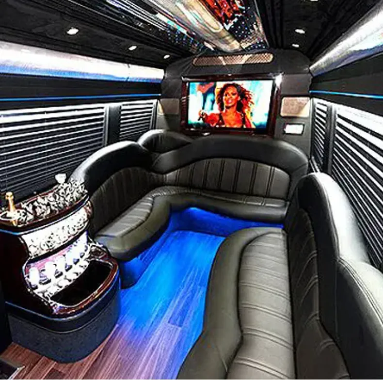 Mercedes Sprinter Limo interior with perimeter lounge seating, window shades and LED accent lighting for party bus rental in Orange County, CA Mercedes Sprinter Limo interior with perimeter lounge seating, window shades and LED accent lighting for party bus rental in Orange County, CA
