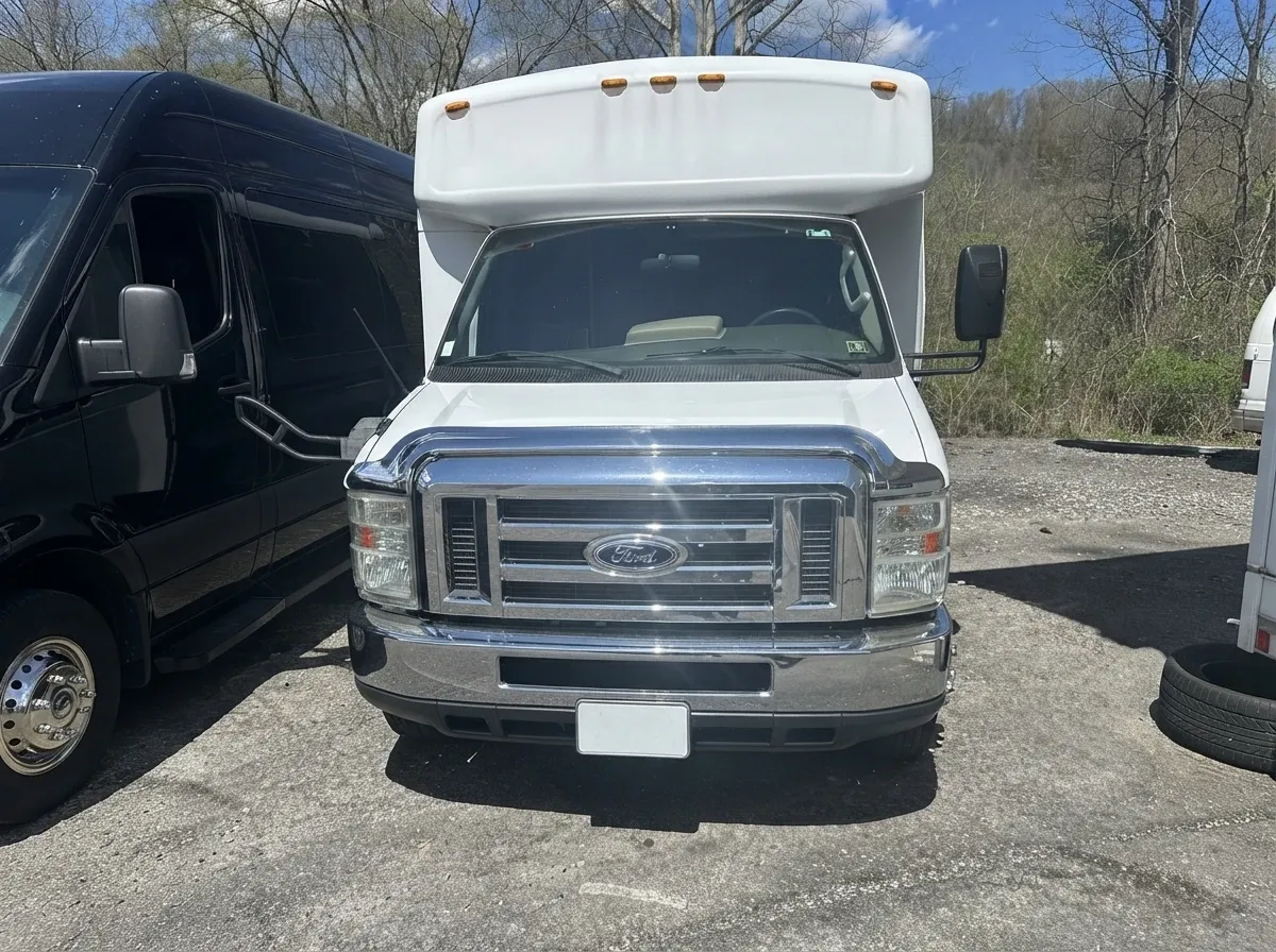 White 18 Passenger Party Bus offered for party bus rental
