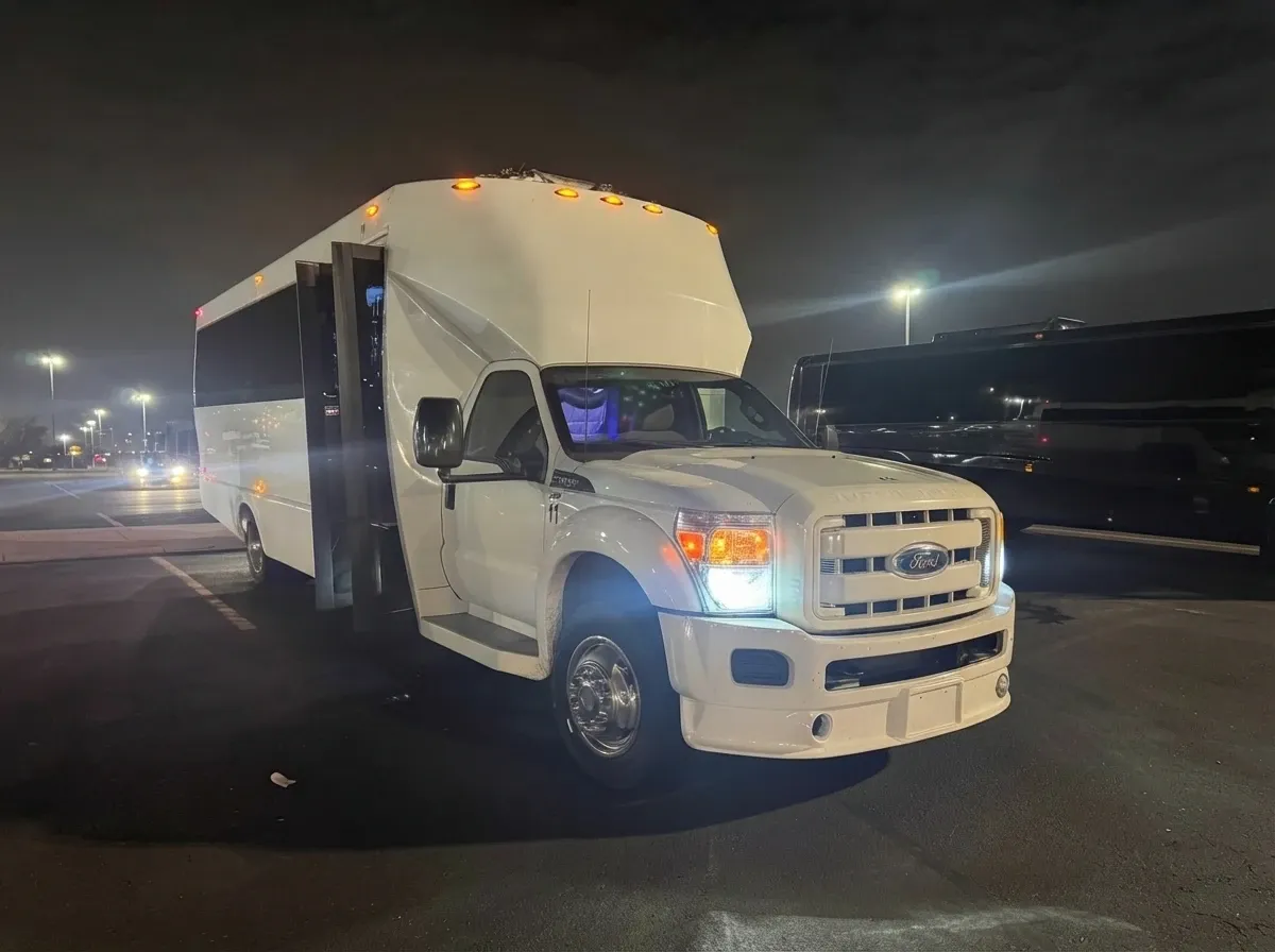White 24 Passenger Party Bus offered for party bus rental