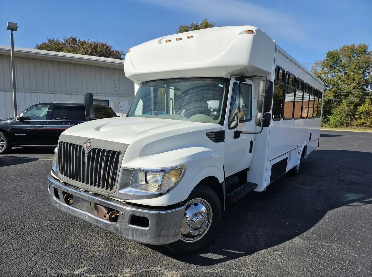 18 Passenger Party Bus White 18 Passenger Party Bus offered for party bus rental