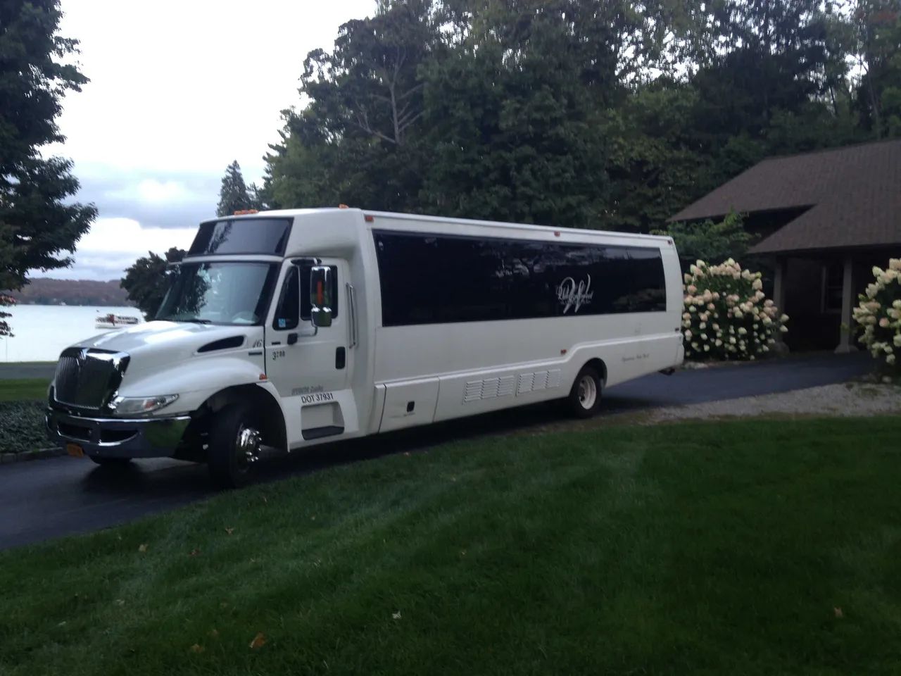 Party Bus - Dean Martin White Party Bus - Dean Martin with tinted windows for party bus rental