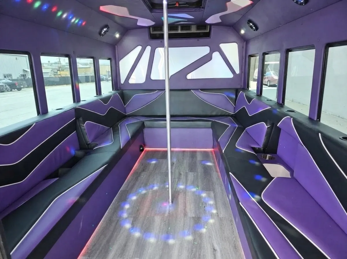 Purpleline Party Bus White Purpleline Party Bus offered for party bus rental