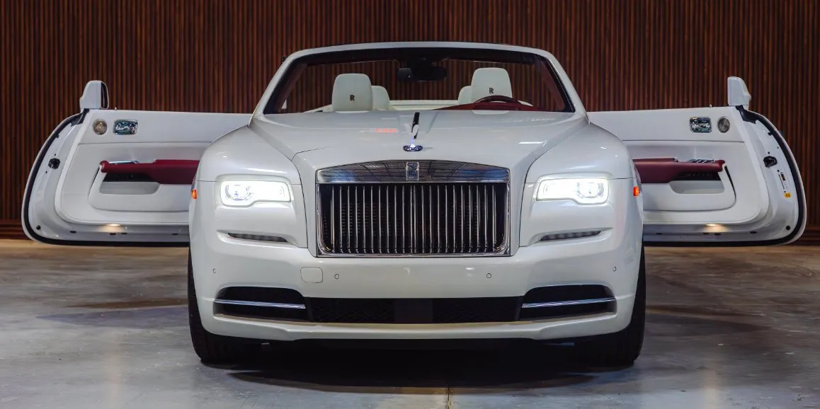 White Rolls-Royce Dawn exterior shot no. 3 — convertible roof