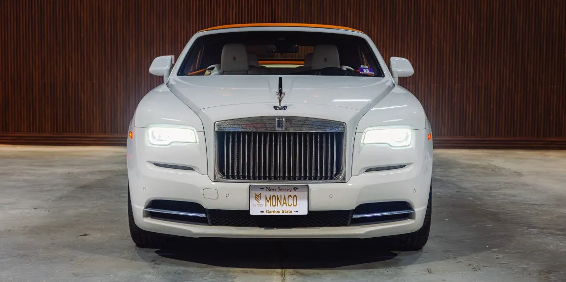 White Rolls-Royce Dawn (Hermes) exterior shot — convertible roof