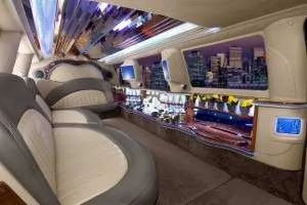 White Ford Excursion Limousine offered for limo rental