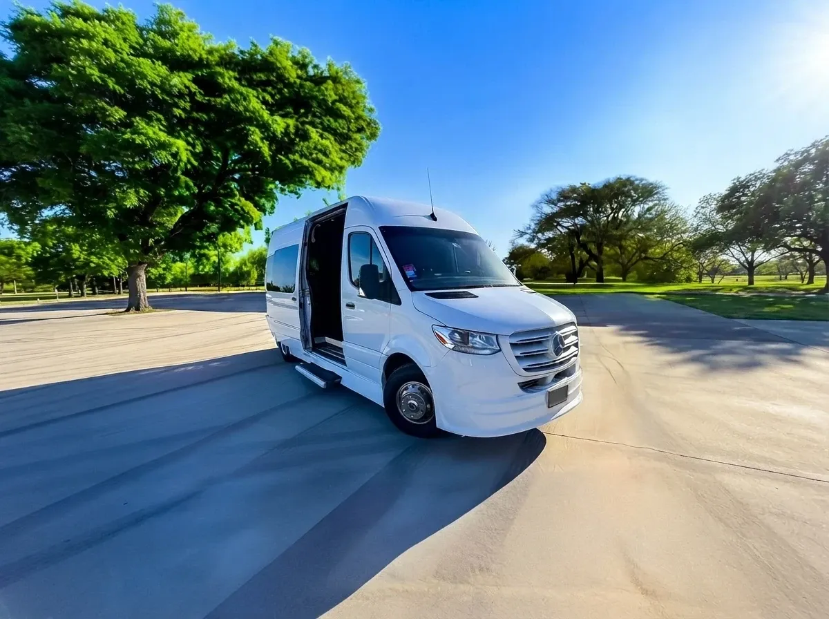 White Mercedes-Benz Sprinter Limousine offered for party bus rental