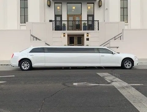 White Chrysler 300 Stretch for limo rental in Kingsford, MI White Chrysler 300 Stretch for limo rental in Kingsford, MI